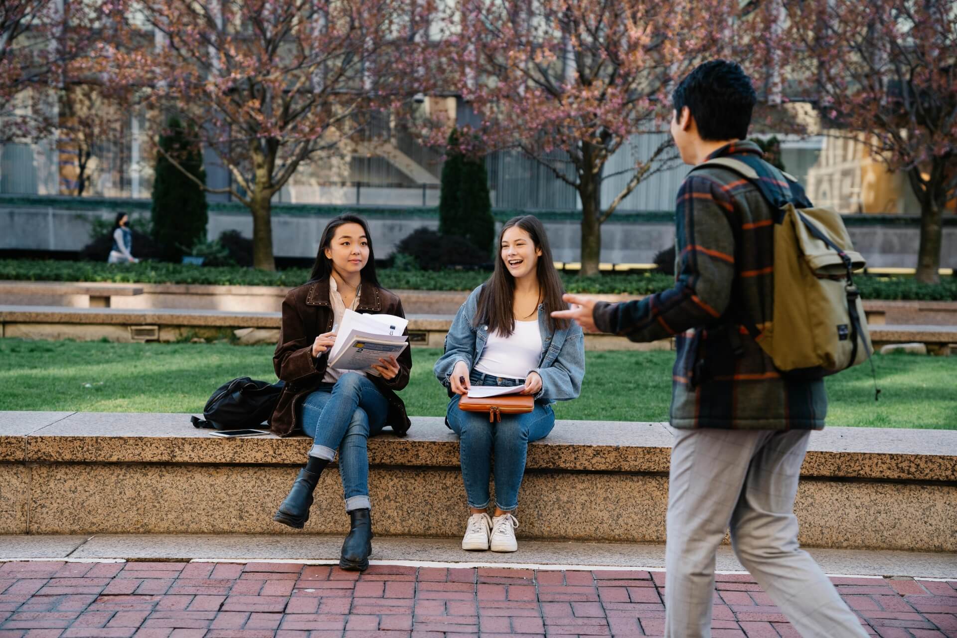 Young students siting on the campus
